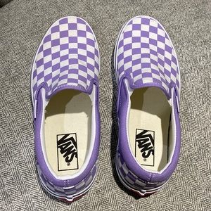 Brand new, never worn Vans slip ons.